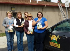 Representatives from Rotary, Bigfork Schools and the Montana Foodbank Network at the first delivery.